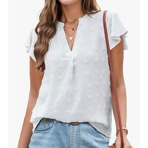 B white notched neck blouse with ruffled cap sleeves and textured Swiss dot patt